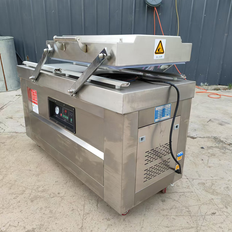 Double chamber vacuum packaging machine