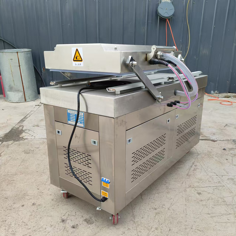 Double chamber vacuum packaging machine